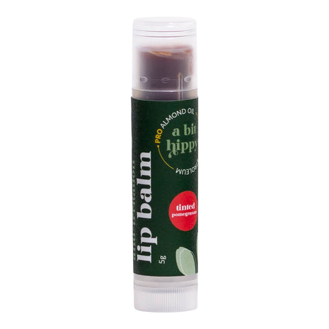 Tube of red tinted vegan lip balm.