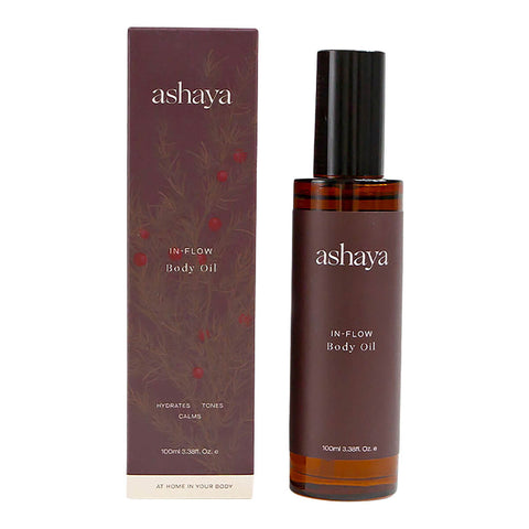 100ml bottle of ashaya In-Flow Body Oil next to its box, formulated to support skin during the menstrual years. This healing botanical blend, infused with precious ingredients, helps firm, tone, and deeply hydrate the skin while soothing inflammation. Suitable for all skin types.