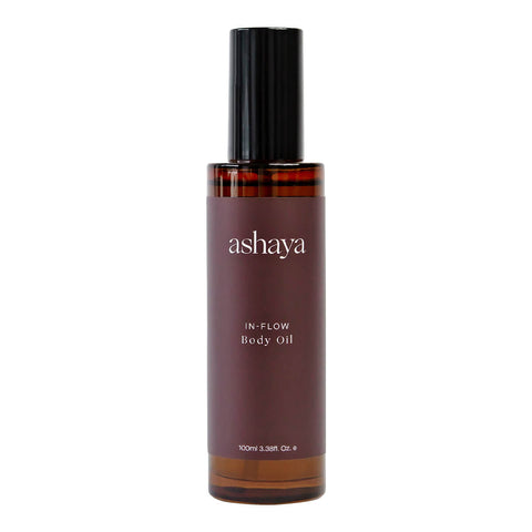 100ml bottle of ashaya In-Flow Body Oil, formulated to support skin during the menstrual years. This healing botanical oil blend, infused with precious ingredients, helps firm, tone, and deeply hydrate the skin while soothing inflammation. Suitable for all skin types.