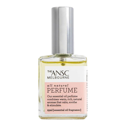 A glass bottle of natural perfume with a strong floral scent.