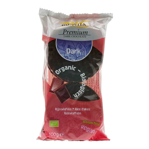 Packet of vegan rice cakes covered in dark chocolate.