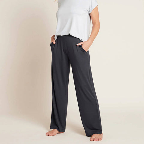 Front of navy blue coloured wide leg pants made of organic bamboo.