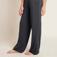 Side of navy blue coloured wide leg pants made of organic bamboo.