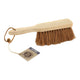 Dust brush made of biodegradable coconut fibres.