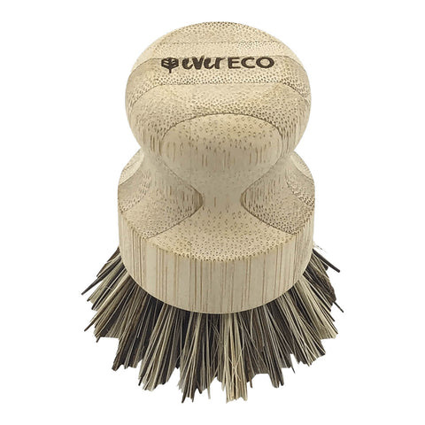 Pot scrubber made of bamboo and palm leaf bristles.