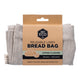 Reusable linen bread bag packaged with a cardboard tag.