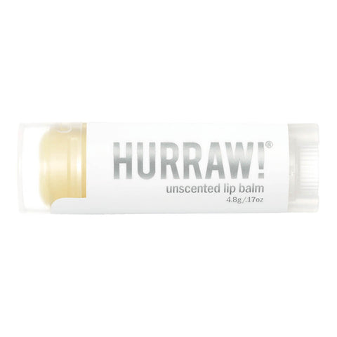 Tube of unscented organic lip balm.