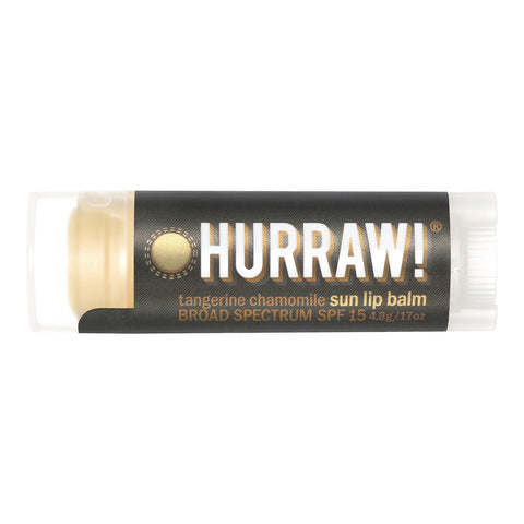 Tube of tangerine chamomile organic lip balm with SPF15.