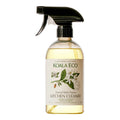 Spray bottle of natural multi-purpose kitchen cleaner with Australian lemon myrtle and mandarin essential oil.