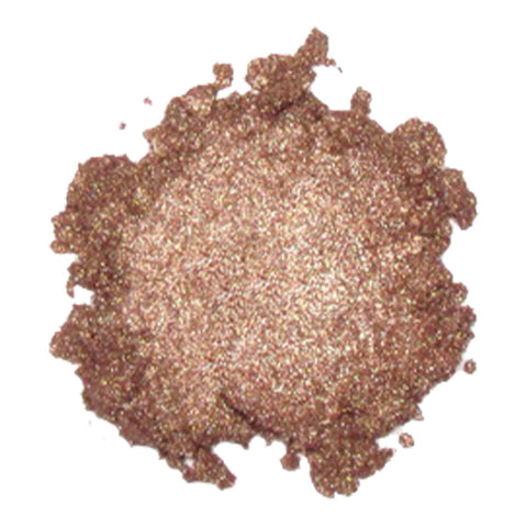 Swatch of Kylie's Professional Mineral Goddess Eyeshadow in the shade 'Antique Gold', a rusty-gold shimmer.