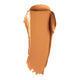 Swatch of cream foundation in the shade 'Bamboo', a deep tan shade with warm undertones.