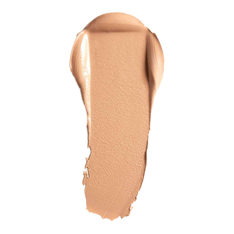 Swatch of cream foundation in the shade 'Calico', a tan shade with neutral undertones.