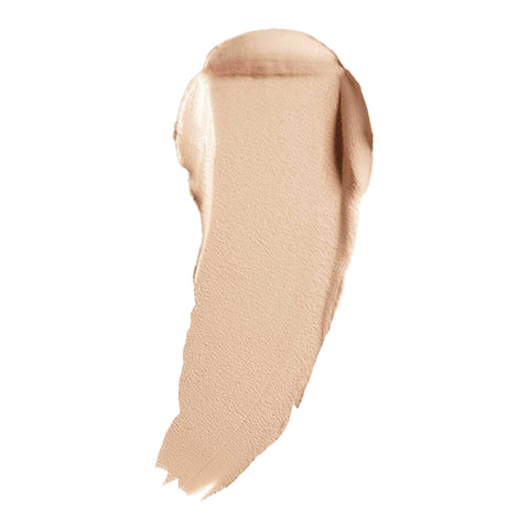 Swatch of cream foundation in the shade 'Cotton', a light shade with neutral undertones.