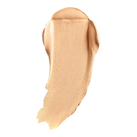 Swatch of cream foundation in the shade 'Linen', a medium shade with warm undertones.