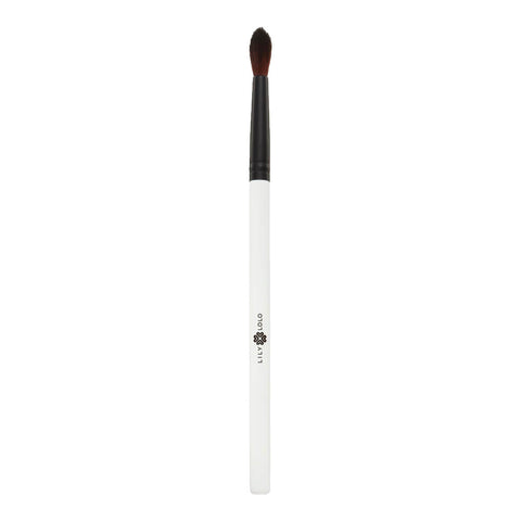 Vegan tapered blending makeup brush with soft bristles in a domed shape ideal for controlled application of eyeshadows.