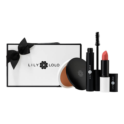 Lily Lolo The Bestsellers Collection, a makeup set including Pressed Bronzer in shade Miami Beach, black Big Lash Mascara, and Vegan Lipstick in Birthday Suit.