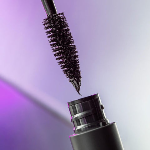 Close up of Madara Come Closer Infinite Lash Mascara brush, a peptide-infused, jet black mascara that gives volume, length and definition for natural-looking, timeless elegance. The fibre brush is a unique conical shape.