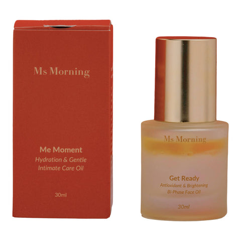 30ml bottle of Ms Morning Get Ready Antioxidant & Brightening Bi-Phase Face Oil, infused with organic antioxidants and brightening ingredients to protect and prep the skin, placed next to its red box. The product is packaged in a frosted glass bottle with a gold cap.