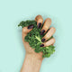 Nails painted with non-toxic, glossy black nail polish with kale protein infusion.