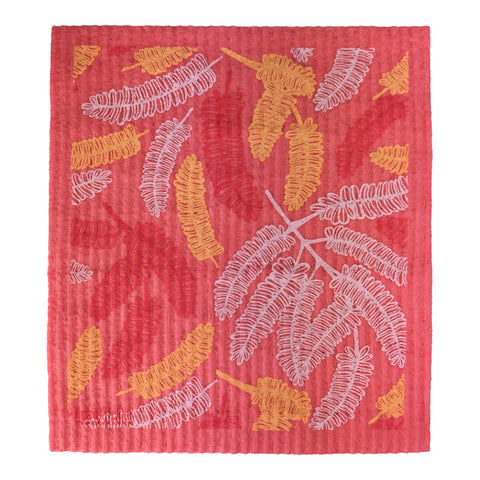 Compostable sponge cloth with a poinciana design.