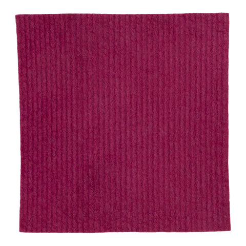 Dark pink organic dyed compostable sponge cloth.