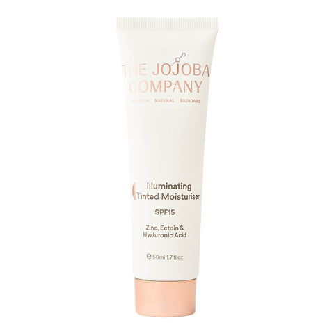 50ml tube of The Jojoba Company Illuminating Tinted Moisturiser, a daily jojoba based tinted moisturiser to enhance skin radiance, hydrate, and provide protection to the skin. Contains zinc, Ectoin, and hyaluronic acid.