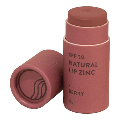 10g stick of Winki Zinc's Tinted Lip Zinc, a mineral-based lip balm designed to heal and protect your lips from the sun while adding a hint of natural colour. Shade Berry, a deep, red/pink hue with warm brown undertones (deep pigment).